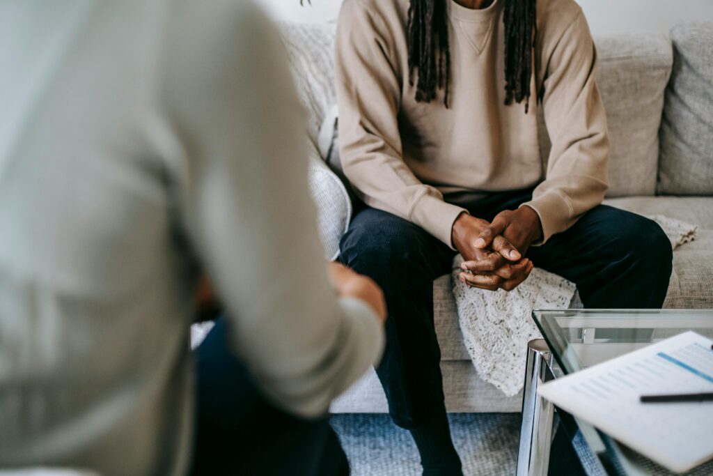 A person in therapy for dissociative disorder treatment.
